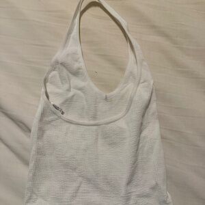 White, sleeveless, cropped top